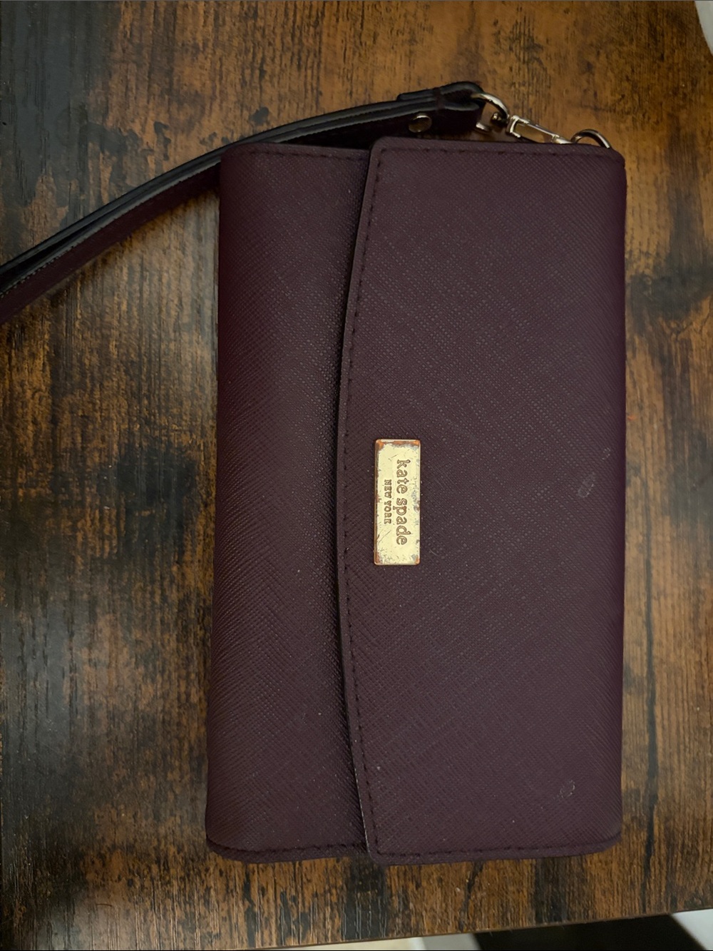 kate spade Deep Plum Wristlet with Gold Plaque
